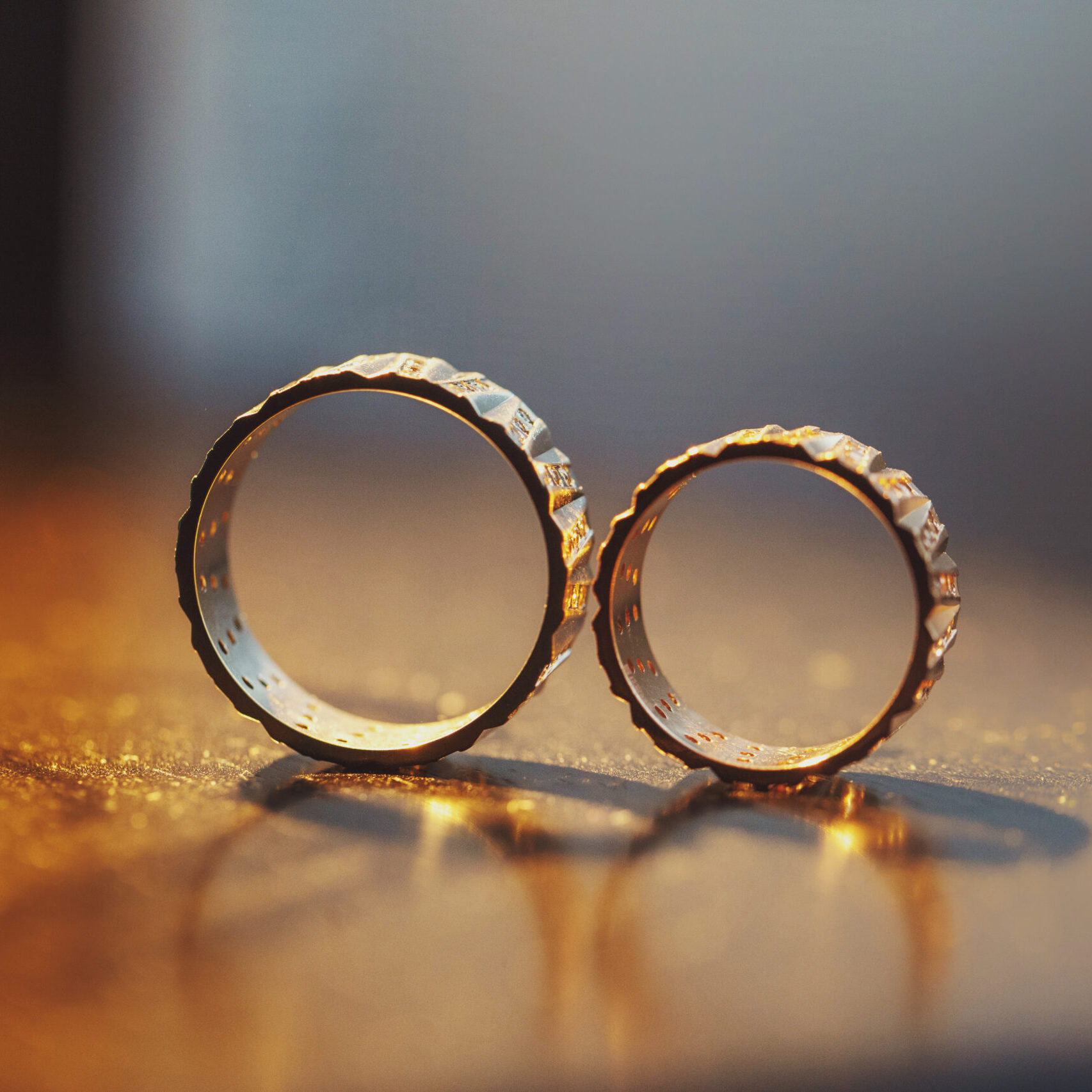 Wedding rings solo on the woden table Wedding rings solo on the woden table